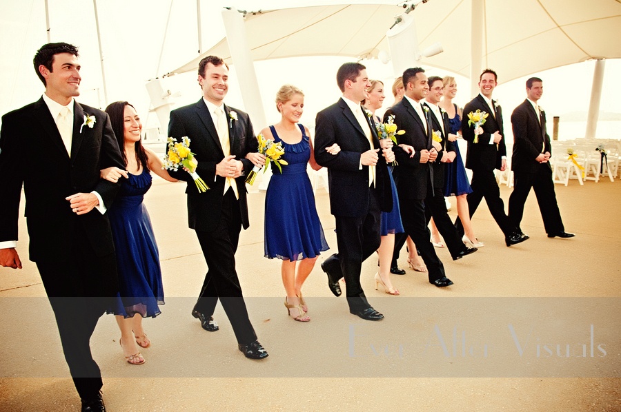 The bridal party looked so nice with the bridesmaids in their beautiful navy dresses and the groomsmen in their cream vests