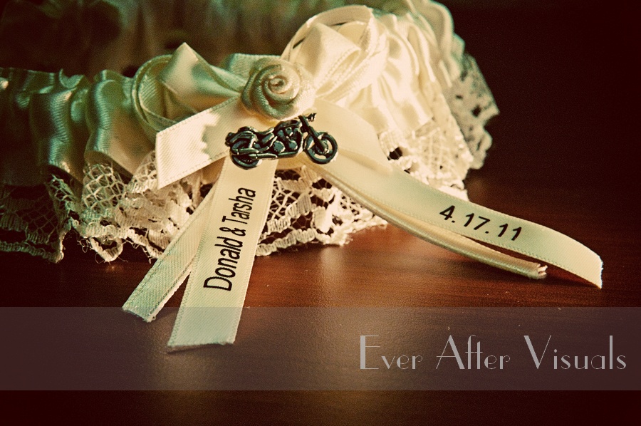 Unique items make a wedding such as Tarsha's garter with the Wedding date AND my favorite, a motorcycle on it