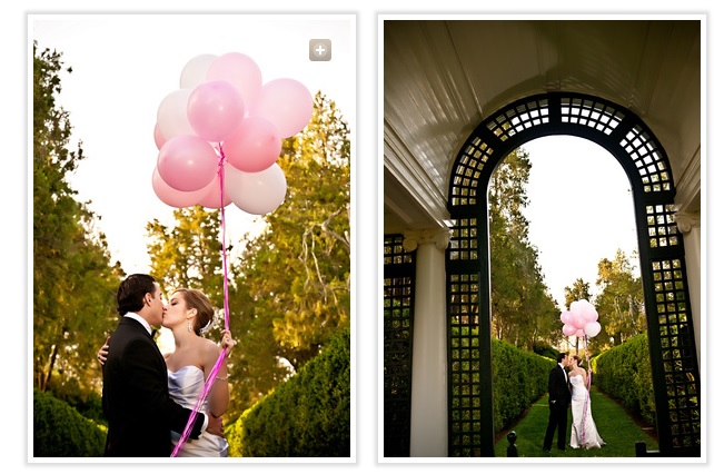 bride-and-groom-kiss-holding-pink-balloons