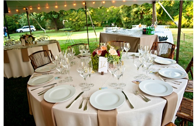 Wedding decor reception table with flowers outdoors